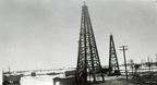 Wooden derricks on the Goose Creek Oil Field, late teens to early 1920s