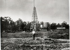 Pipe Department Foreman Tom Maloney in front of No. 1 water well, circa 1919