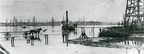 Tabbs Bay derricks in the Goose Creek Oil Field. Circa 1916-1923